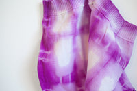 Close up of shibori pattern and waistband on postpartum mesh underwear, purple colour